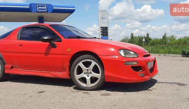 Красный Мазда МХ-3, объемом двигателя 1.8 л и пробегом 440 тыс. км за 3100 $, фото 5 на Automoto.ua