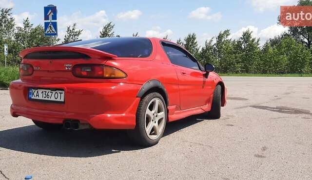 Красный Мазда МХ-3, объемом двигателя 1.8 л и пробегом 440 тыс. км за 3100 $, фото 1 на Automoto.ua