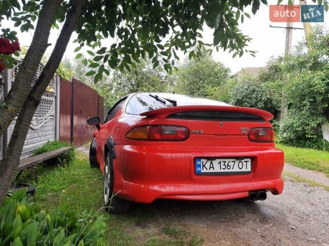 Красный Мазда МХ-3, объемом двигателя 1.8 л и пробегом 440 тыс. км за 3100 $, фото 7 на Automoto.ua