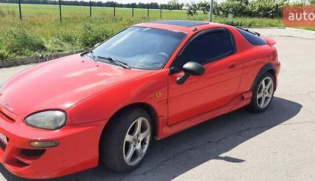 Красный Мазда МХ-3, объемом двигателя 1.8 л и пробегом 440 тыс. км за 3100 $, фото 6 на Automoto.ua