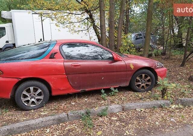 Красный Мазда МХ-3, объемом двигателя 1.6 л и пробегом 250 тыс. км за 1300 $, фото 3 на Automoto.ua