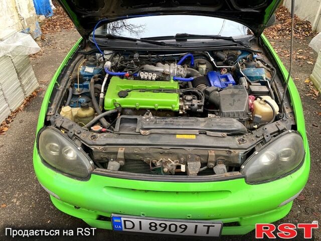 Зелений Мазда МХ-3, об'ємом двигуна 1.6 л та пробігом 0 тис. км за 2700 $, фото 6 на Automoto.ua