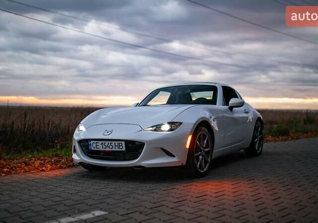 Белый Мазда МХ-5, объемом двигателя 2 л и пробегом 32 тыс. км за 27000 $, фото 23 на Automoto.ua