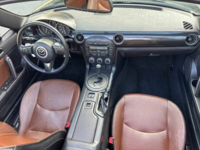Чорний Мазда МХ-5, об'ємом двигуна 2 л та пробігом 81 тис. км за 7800 $, фото 7 на Automoto.ua