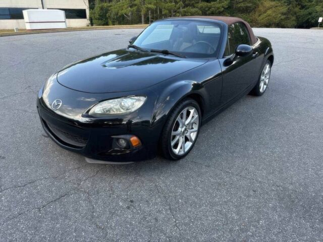 Чорний Мазда МХ-5, об'ємом двигуна 2 л та пробігом 81 тис. км за 7800 $, фото 2 на Automoto.ua