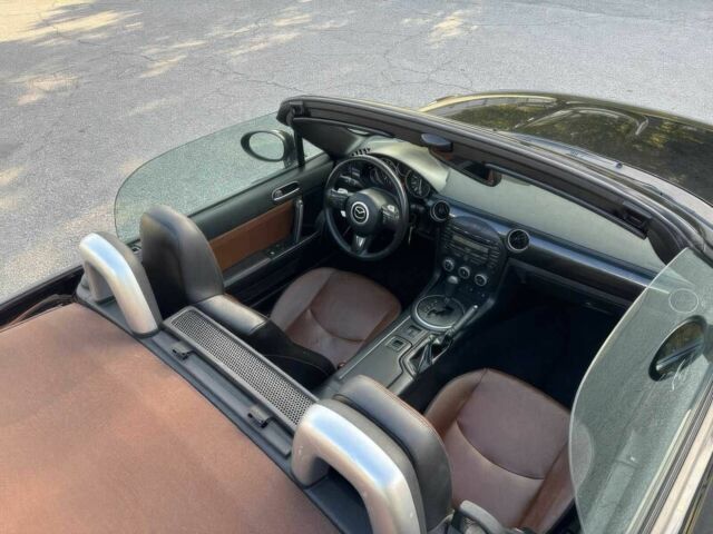 Чорний Мазда МХ-5, об'ємом двигуна 2 л та пробігом 81 тис. км за 7800 $, фото 8 на Automoto.ua