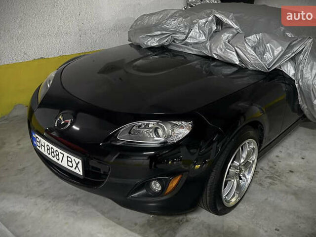 Чорний Мазда МХ-5, об'ємом двигуна 2 л та пробігом 99 тис. км за 12000 $, фото 5 на Automoto.ua
