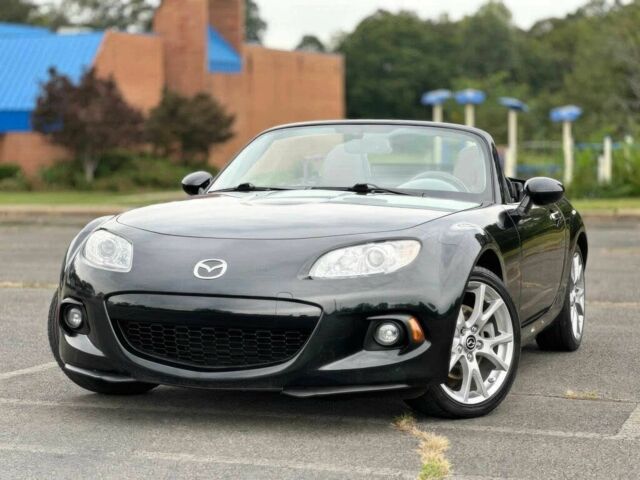 Черный Мазда МХ-5, объемом двигателя 2 л и пробегом 78 тыс. км за 7800 $, фото 1 на Automoto.ua