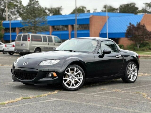 Черный Мазда МХ-5, объемом двигателя 2 л и пробегом 78 тыс. км за 7800 $, фото 2 на Automoto.ua