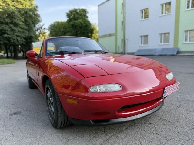 Красный Мазда МХ-5, объемом двигателя 1.6 л и пробегом 263 тыс. км за 11788 $, фото 1 на Automoto.ua