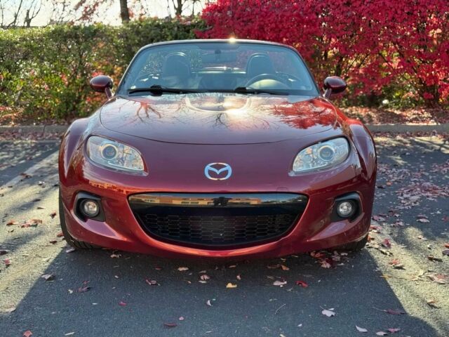Красный Мазда МХ-5, объемом двигателя 2 л и пробегом 89 тыс. км за 6000 $, фото 1 на Automoto.ua