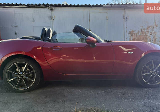 Красный Мазда МХ-5, объемом двигателя 2 л и пробегом 40 тыс. км за 19000 $, фото 1 на Automoto.ua