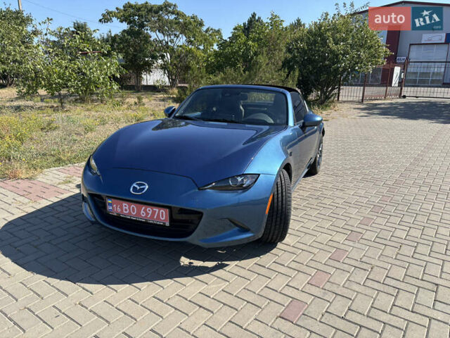 Синій Мазда МХ-5, об'ємом двигуна 2 л та пробігом 70 тис. км за 18900 $, фото 6 на Automoto.ua