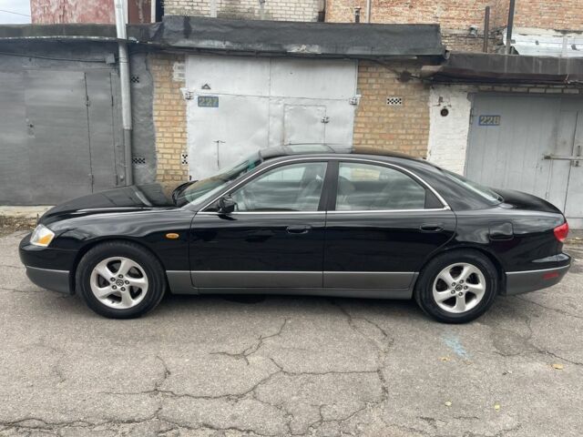 Черный Мазда Милления, объемом двигателя 2.5 л и пробегом 247 тыс. км за 4300 $, фото 2 на Automoto.ua