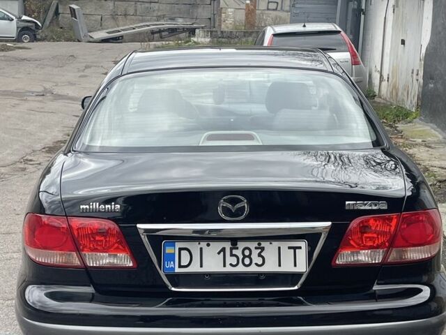 Черный Мазда Милления, объемом двигателя 2.5 л и пробегом 247 тыс. км за 4300 $, фото 3 на Automoto.ua
