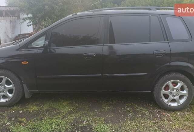 Мазда Премаси 1999 в Тернополе на Automoto.ua Черный Мазда Премаси, объемом двигателя 2 л и пробегом 312 тыс. км за 2999 $, фото 6 на Automoto.ua