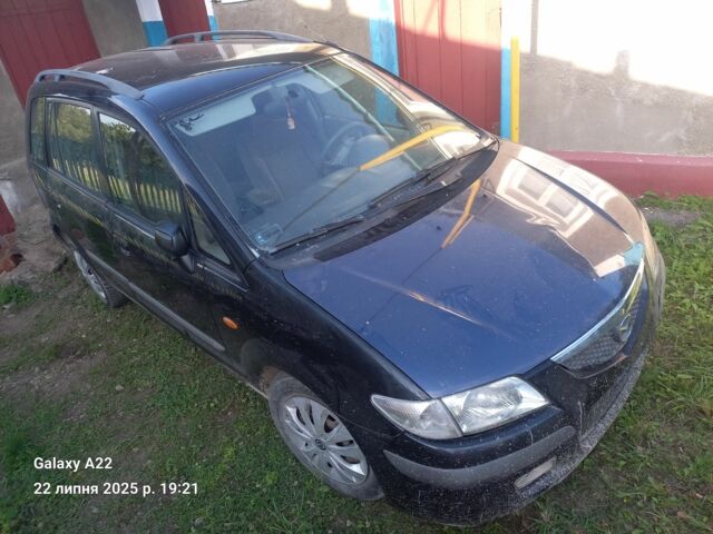 Черный Мазда Премаси, объемом двигателя 2 л и пробегом 300 тыс. км за 570 $, фото 1 на Automoto.ua