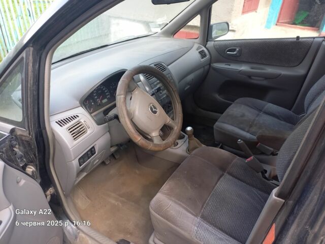 Черный Мазда Премаси, объемом двигателя 2 л и пробегом 300 тыс. км за 800 $, фото 1 на Automoto.ua