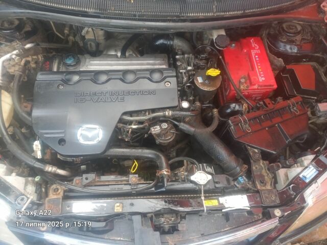 Черный Мазда Премаси, объемом двигателя 2 л и пробегом 300 тыс. км за 800 $, фото 4 на Automoto.ua