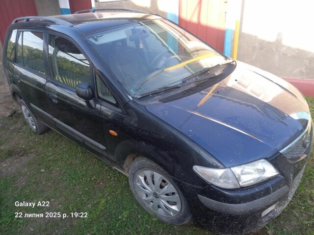 Черный Мазда Премаси, объемом двигателя 2 л и пробегом 300 тыс. км за 570 $, фото 2 на Automoto.ua