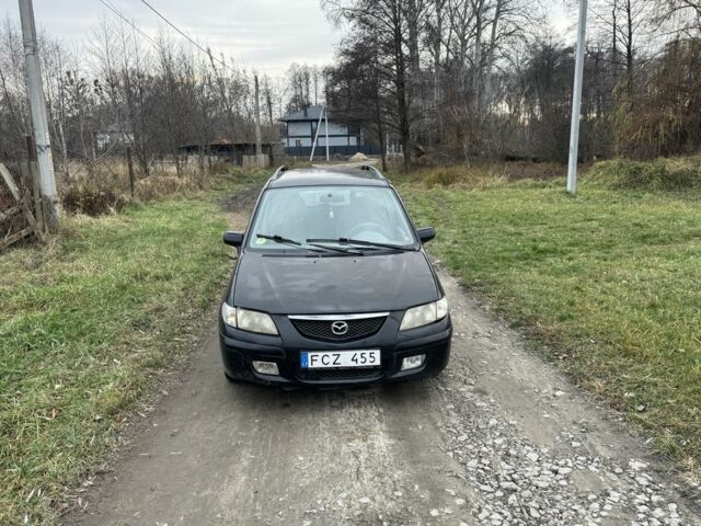 Чорний Мазда Премасі, об'ємом двигуна 2 л та пробігом 200 тис. км за 850 $, фото 1 на Automoto.ua