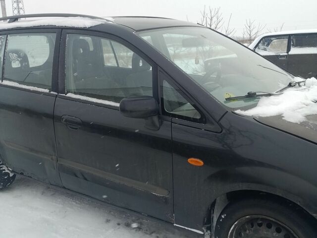 Чорний Мазда Премасі, об'ємом двигуна 2 л та пробігом 100 тис. км за 901 $, фото 5 на Automoto.ua