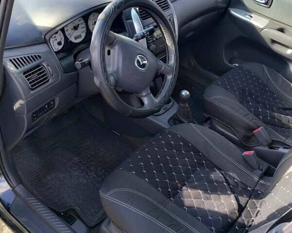 Черный Мазда Премаси, объемом двигателя 2 л и пробегом 250 тыс. км за 2850 $, фото 5 на Automoto.ua