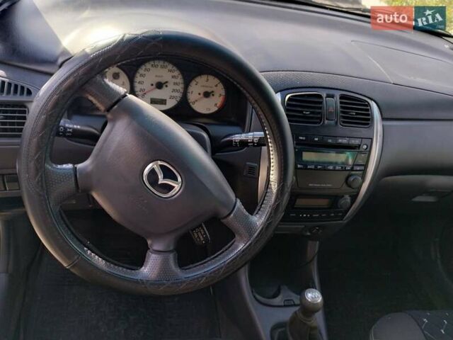Черный Мазда Премаси, объемом двигателя 2 л и пробегом 250 тыс. км за 2850 $, фото 6 на Automoto.ua
