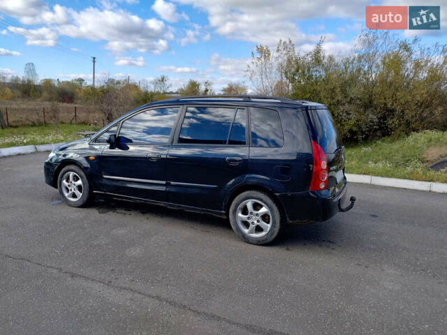 Черный Мазда Премаси, объемом двигателя 2 л и пробегом 250 тыс. км за 2850 $, фото 2 на Automoto.ua