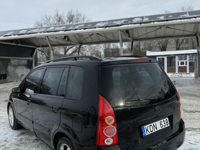 Черный Мазда Премаси, объемом двигателя 2 л и пробегом 240 тыс. км за 1500 $, фото 7 на Automoto.ua