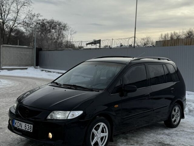 Черный Мазда Премаси, объемом двигателя 2 л и пробегом 240 тыс. км за 1500 $, фото 1 на Automoto.ua