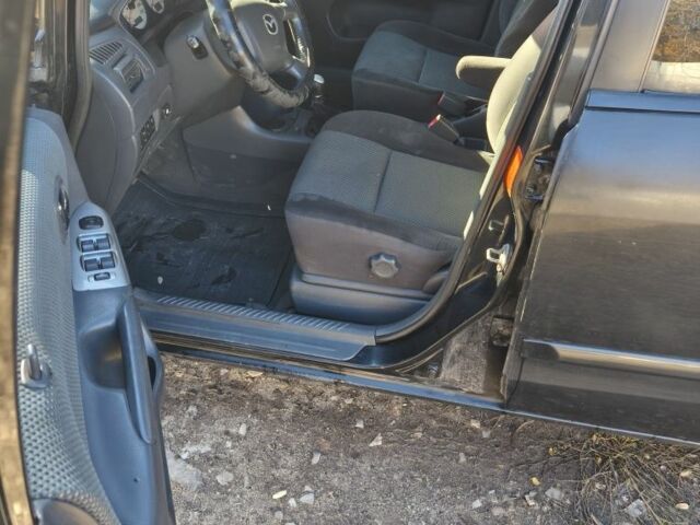 Черный Мазда Премаси, объемом двигателя 0 л и пробегом 200 тыс. км за 2500 $, фото 2 на Automoto.ua