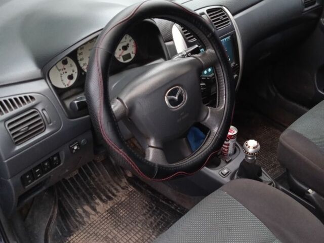 Черный Мазда Премаси, объемом двигателя 2 л и пробегом 246 тыс. км за 1069 $, фото 3 на Automoto.ua