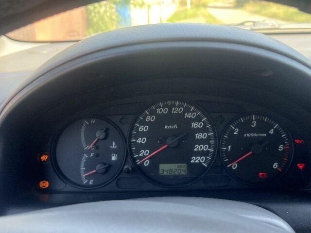 Мазда Премаси 1999 в Кицмане на Automoto.ua Красный Мазда Премаси, объемом двигателя 2 л и пробегом 348 тыс. км за 2700 $, фото 6 на Automoto.ua