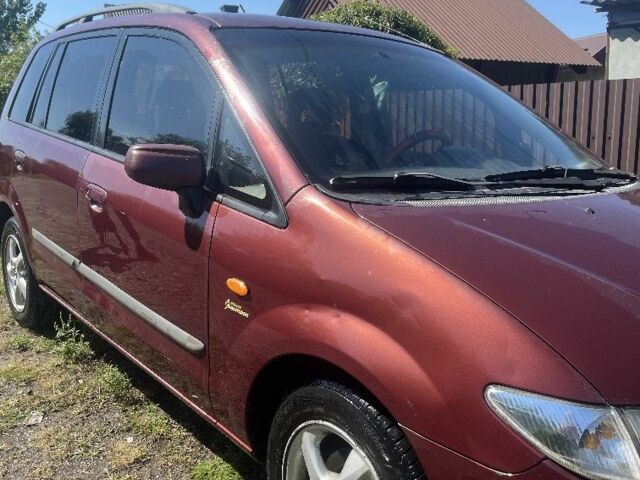 Мазда Премаси 1999 в Кицмане на Automoto.ua Красный Мазда Премаси, объемом двигателя 2 л и пробегом 348 тыс. км за 2700 $, фото 3 на Automoto.ua