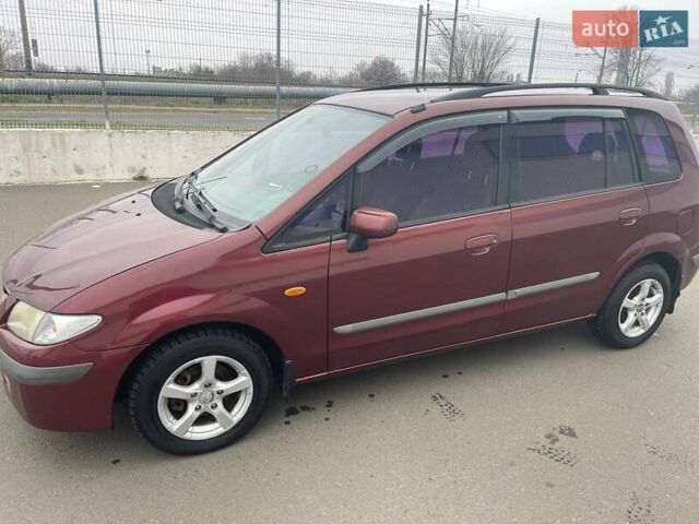 Красный Мазда Премаси, объемом двигателя 2 л и пробегом 306 тыс. км за 3600 $, фото 9 на Automoto.ua