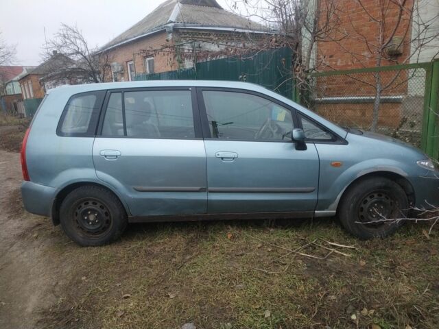 Серый Мазда Премаси, объемом двигателя 2 л и пробегом 260 тыс. км за 1800 $, фото 3 на Automoto.ua