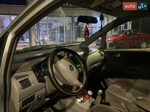 Сірий Мазда Премасі, об'ємом двигуна 1.8 л та пробігом 242 тис. км за 1999 $, фото 3 на Automoto.ua