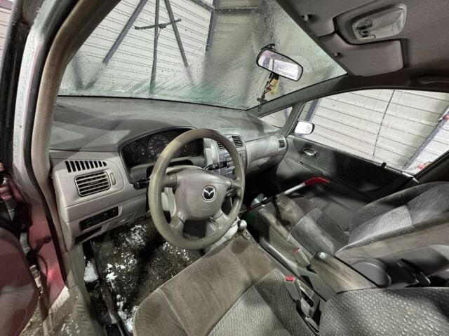 Серый Мазда Премаси, объемом двигателя 2 л и пробегом 300 тыс. км за 1200 $, фото 7 на Automoto.ua