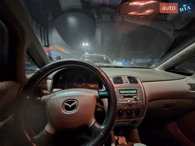 Сірий Мазда Премасі, об'ємом двигуна 1.8 л та пробігом 349 тис. км за 2500 $, фото 26 на Automoto.ua