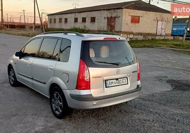 Серый Мазда Премаси, объемом двигателя 1.84 л и пробегом 200 тыс. км за 2700 $, фото 4 на Automoto.ua