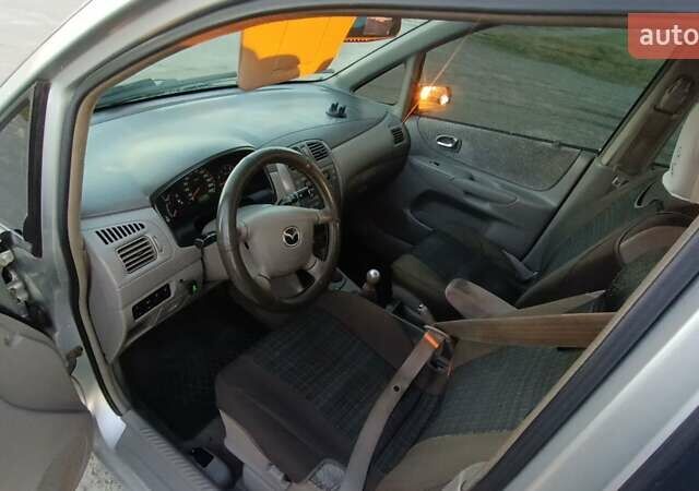 Серый Мазда Премаси, объемом двигателя 1.84 л и пробегом 200 тыс. км за 2700 $, фото 26 на Automoto.ua