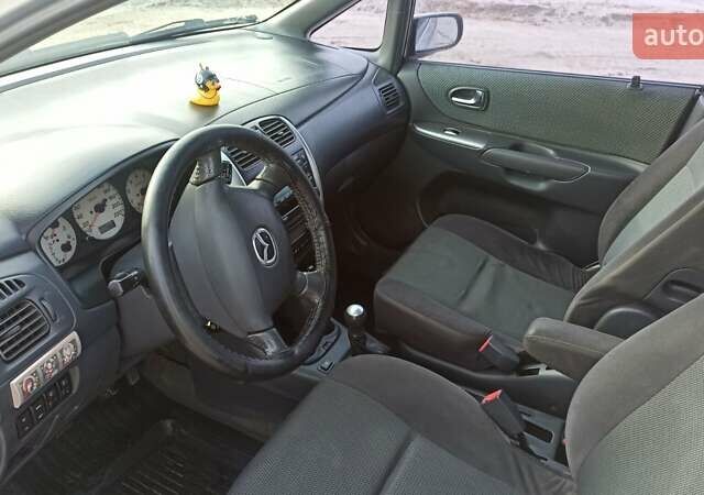 Сірий Мазда Премасі, об'ємом двигуна 1.8 л та пробігом 345 тис. км за 3080 $, фото 4 на Automoto.ua