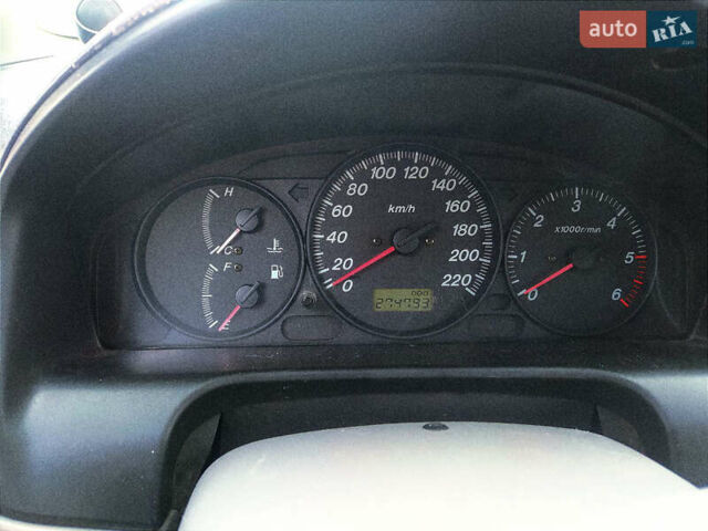 Серый Мазда Премаси, объемом двигателя 2 л и пробегом 295 тыс. км за 3000 $, фото 3 на Automoto.ua