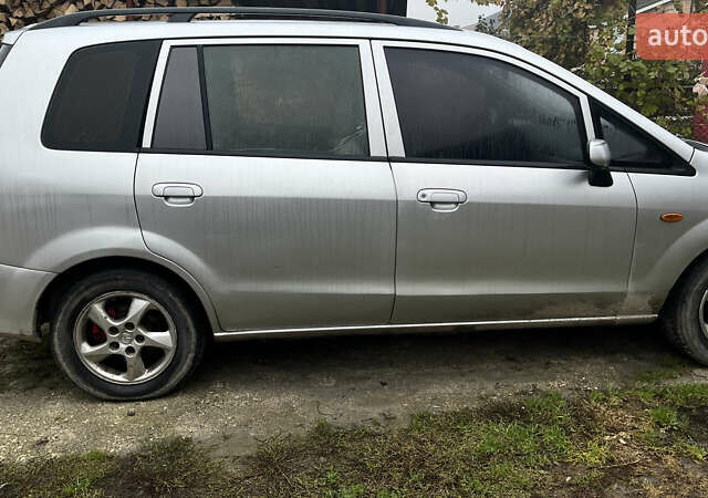 Серый Мазда Премаси, объемом двигателя 2 л и пробегом 295 тыс. км за 3000 $, фото 4 на Automoto.ua