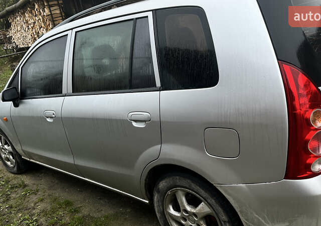 Серый Мазда Премаси, объемом двигателя 2 л и пробегом 295 тыс. км за 3000 $, фото 6 на Automoto.ua