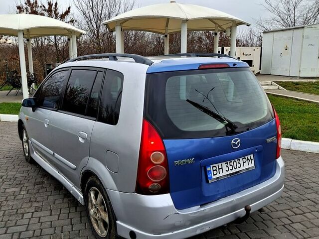 Серый Мазда Премаси, объемом двигателя 1.9 л и пробегом 300 тыс. км за 1600 $, фото 1 на Automoto.ua