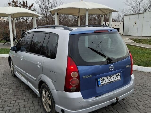 Серый Мазда Премаси, объемом двигателя 2 л и пробегом 320 тыс. км за 1650 $, фото 2 на Automoto.ua