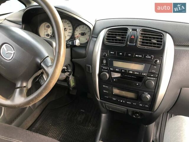 Серый Мазда Премаси, объемом двигателя 2 л и пробегом 200 тыс. км за 4000 $, фото 8 на Automoto.ua