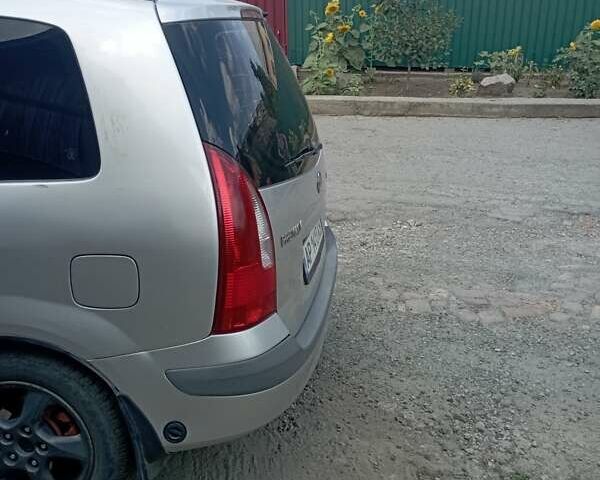 Серый Мазда Премаси, объемом двигателя 2 л и пробегом 200 тыс. км за 3100 $, фото 3 на Automoto.ua